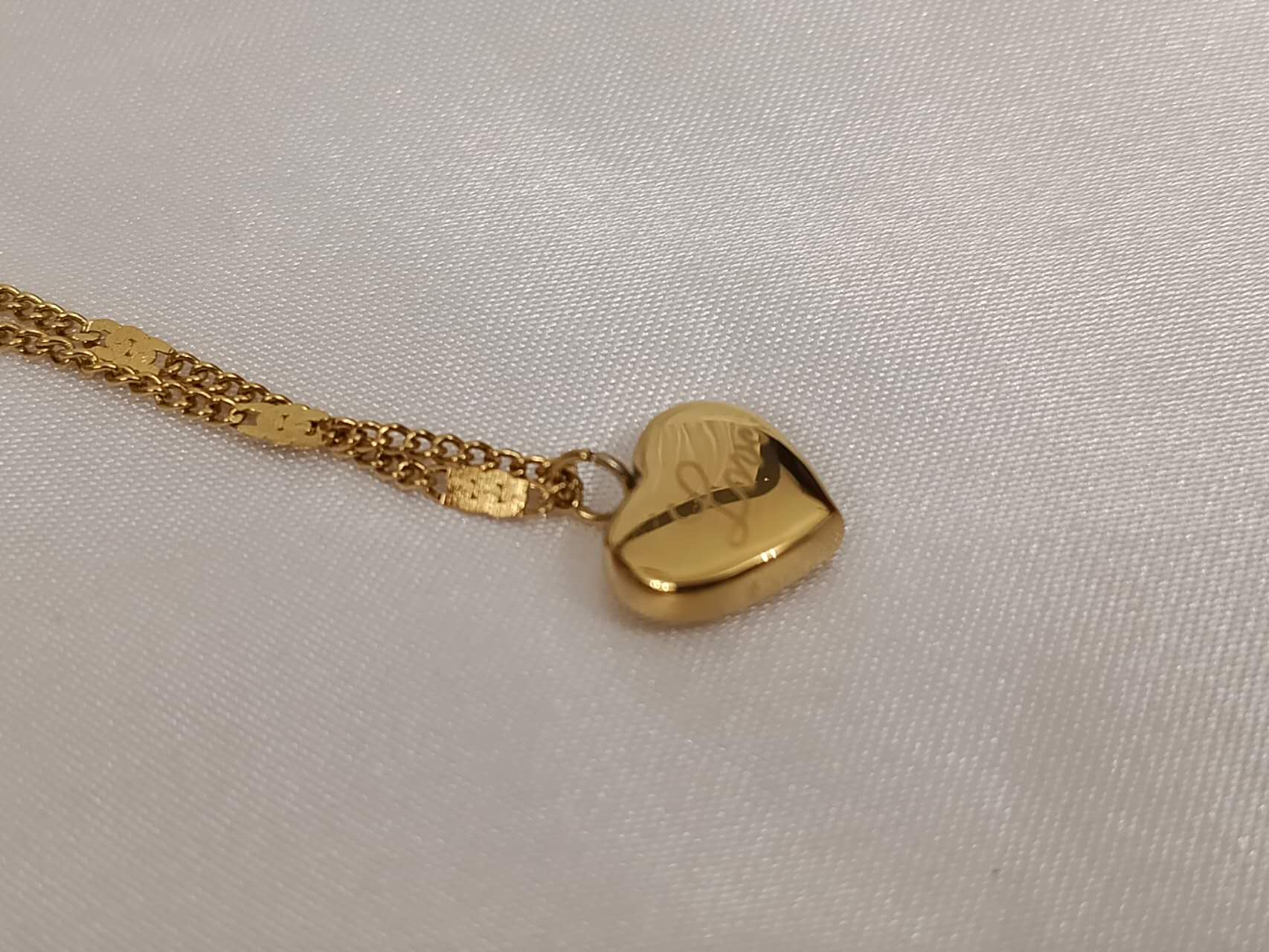 Adjustable necklace with hearts in 18K gold-plated stainless steel